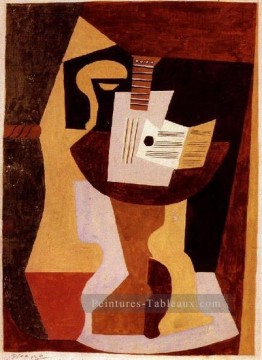 Guitare et partition sur un gueridon 1920 cubisme Pablo Picasso Peinture à l'huile